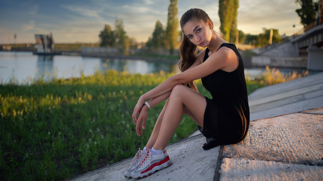Woman sitting ledge water blue free wallpaper for desktop - medium preview image