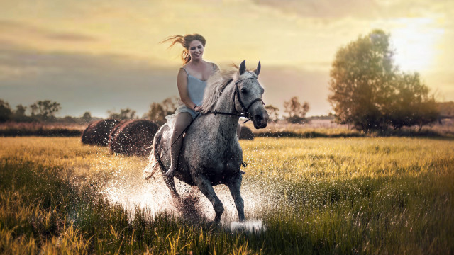 Woman horse field haybales sunset free wallpaper for desktop - medium preview image