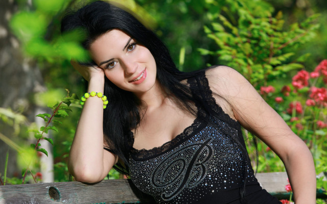 Woman black dress garden portrait #3 free wallpaper for desktop - medium preview image