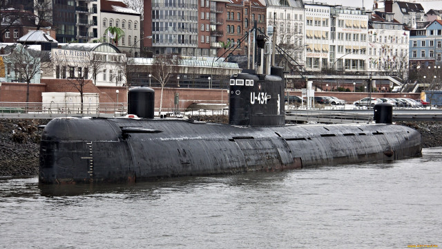 Submarine city bridge man redjacket free wallpaper for desktop - medium preview image