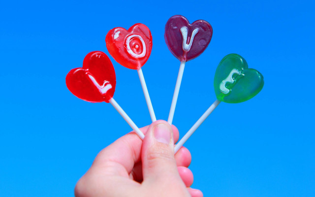 Hand heart lollipops blue sky free wallpaper for desktop - medium preview image