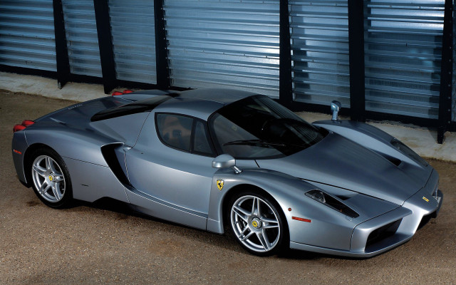 Silver sports car garage door free wallpaper for desktop - medium preview image