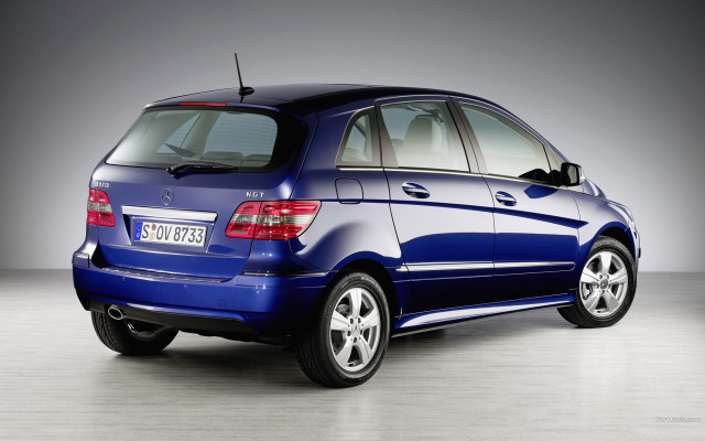 Blue car gray wall black free wallpaper for desktop - medium preview image