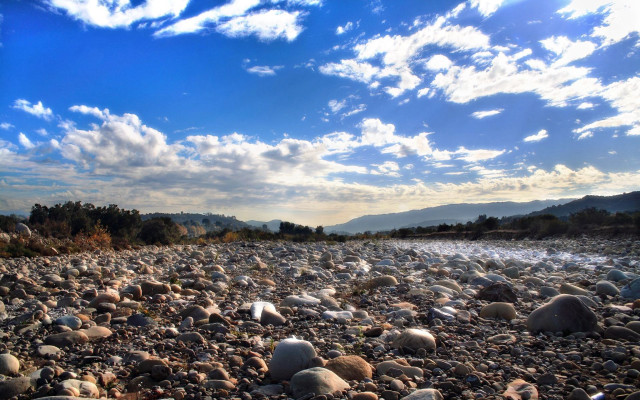Rocky river bed clouds trees free wallpaper for desktop - medium preview image