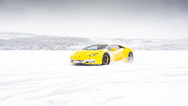 Yellow sports car snow mountains #2 free wallpaper for desktop - medium preview image