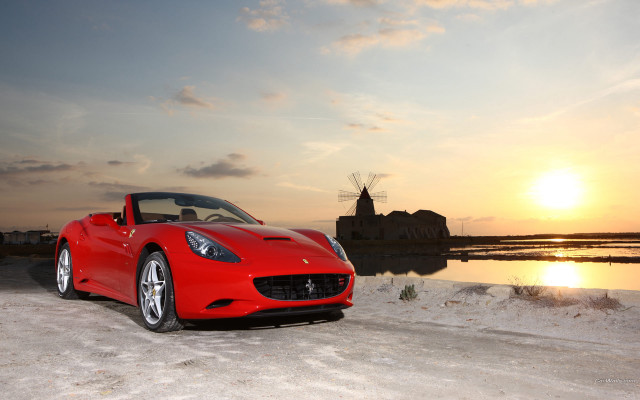 Red sports car windmill sunset free wallpaper for desktop - medium preview image
