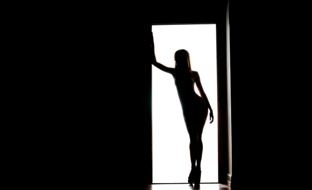 Woman doorway shadow silhouette backlighting free wallpaper for desktop - medium preview image