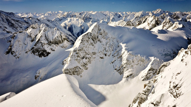 Mountain range plane view skier free wallpaper for desktop - medium preview image