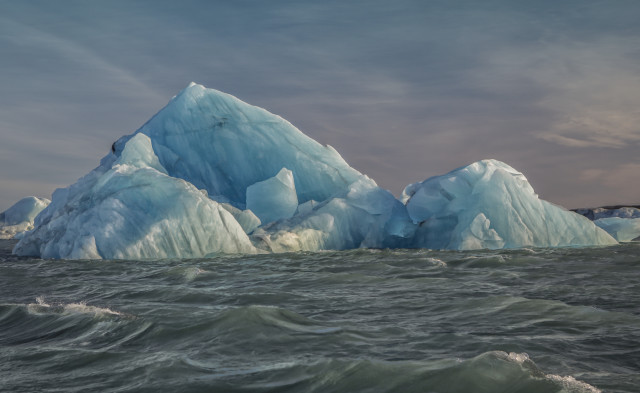 Iceberg ocean waves clouds matte free wallpaper for desktop - medium preview image