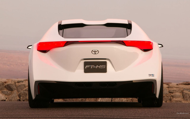 White car parked road rocky free wallpaper for desktop - medium preview image