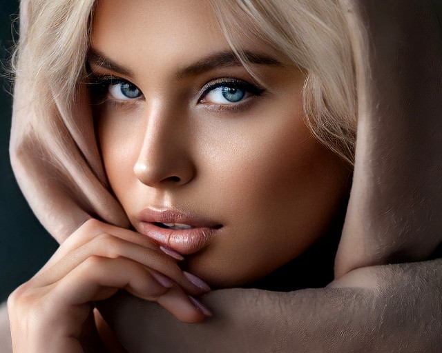 Blonde woman blueeyes hands onface free wallpaper for desktop - medium preview image