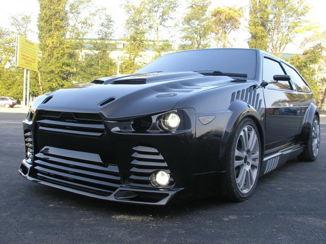 Black sports car parking lot free wallpaper for desktop - medium preview image