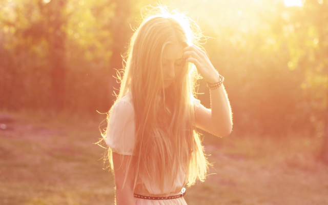 Woman field hair blowing sunset free wallpaper for desktop - medium preview image