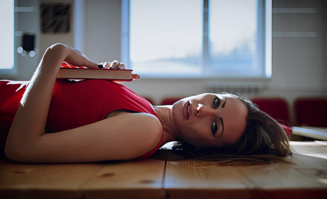 Woman laying book window portrait free wallpaper for desktop - medium preview image