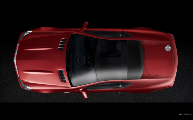 Red sports car above dark free wallpaper for desktop - medium preview image