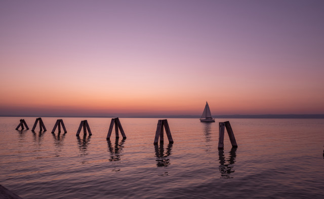 Sailboat dock sunset poles precisionism free wallpaper for desktop - medium preview image
