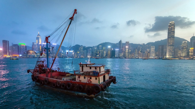 Cityscape boat water night skyline free wallpaper for desktop - medium preview image