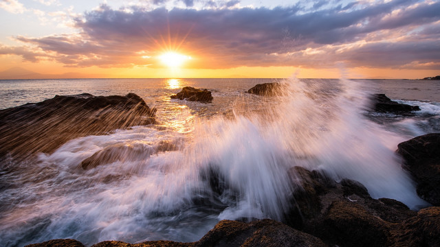 Sunset ocean wave rocks person #2 free wallpaper for desktop - medium preview image