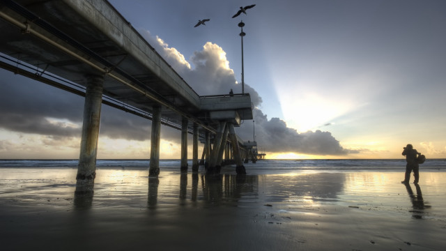 Beach pier sunset birds mountains free wallpaper for desktop - medium preview image