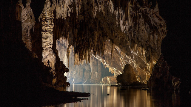 Cave lake boat night lights free wallpaper for desktop - medium preview image