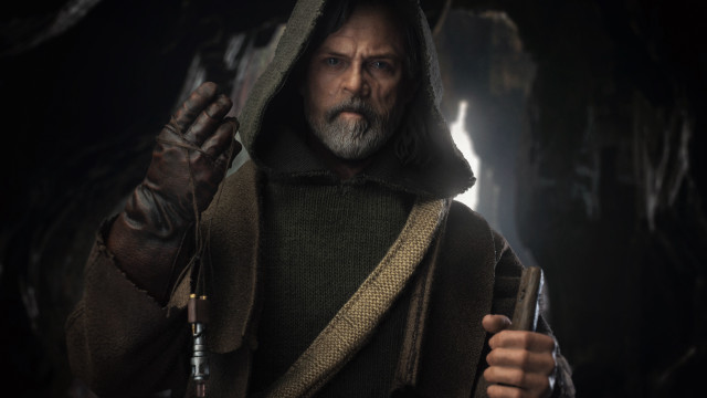 Cave hooded man knife flashlight free wallpaper for desktop - medium preview image