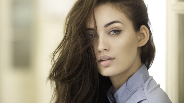 Annabel eyres woman blowing hair free wallpaper for desktop - medium preview image