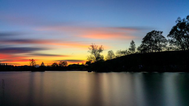 Sunset lake trees hill clouds free wallpaper for desktop - medium preview image