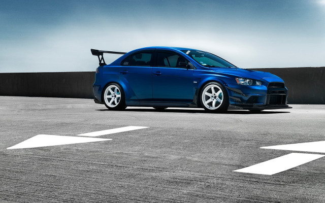 Blue car parking lot white free wallpaper for desktop - medium preview image