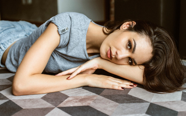 Woman laying on bed argyle free wallpaper for desktop - medium preview image