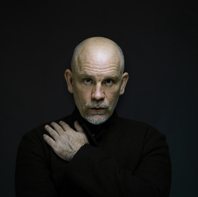 Bald man black shirt hands free wallpaper for tablet - medium preview image