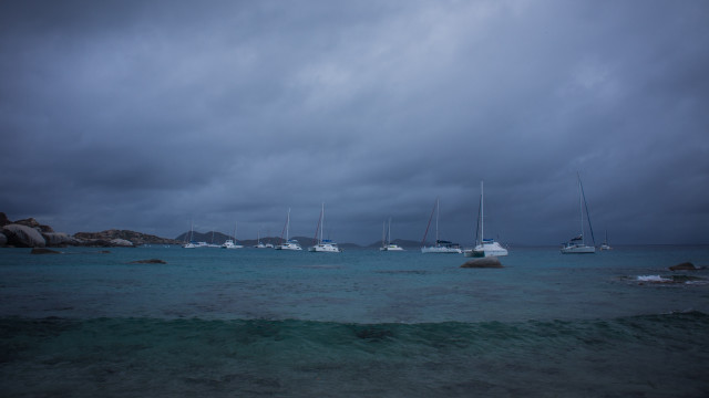 Boats cloudy stormy beach ocean free wallpaper for desktop - medium preview image