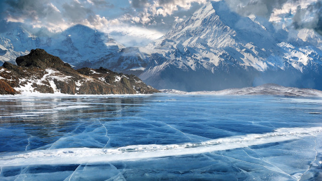 Mountain range frozen lake snow free wallpaper for desktop - medium preview image