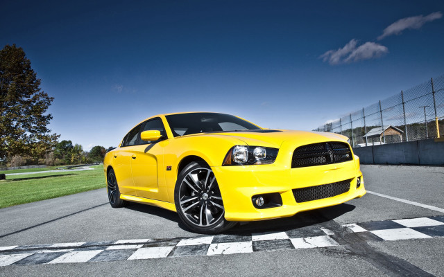 Yellow car checkered road blue free wallpaper for desktop - medium preview image