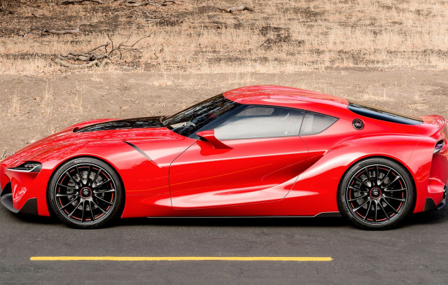 Red sports car side road free wallpaper for desktop - medium preview image