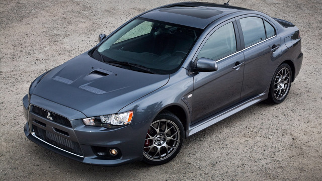 Grey car parking lot military free wallpaper for desktop - medium preview image