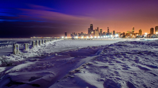 Snowy beach city skyline night free wallpaper for desktop - medium preview image