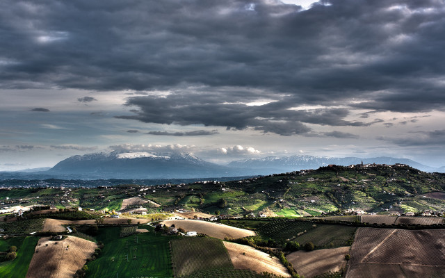 Mountain range cloudy sky town free wallpaper for desktop - medium preview image
