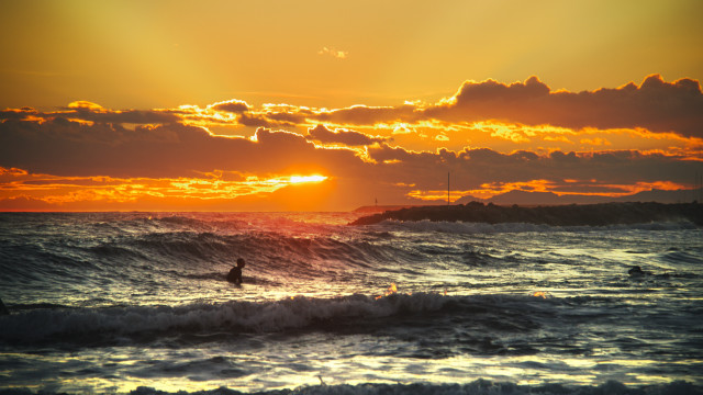 Surfing sunset ocean wave beach free wallpaper for desktop - medium preview image