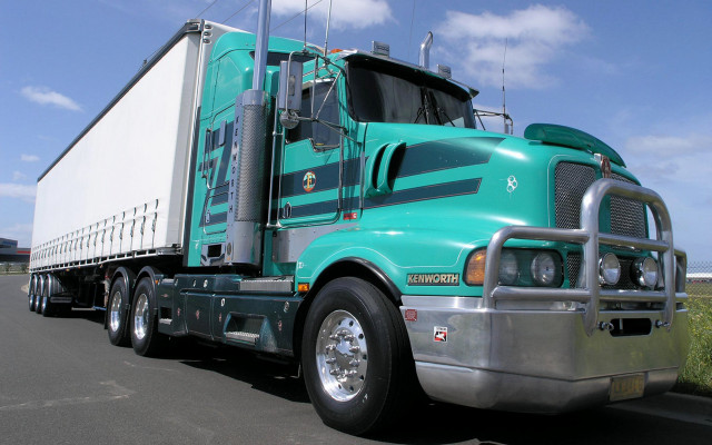 Green semi truck road grass free wallpaper for desktop - medium preview image