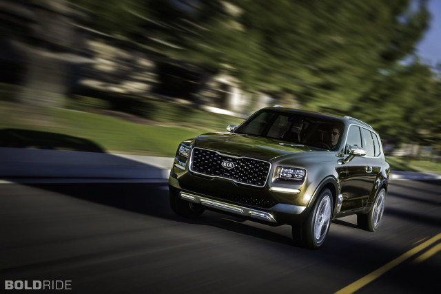 Green suv driving street lush free wallpaper for desktop - medium preview image