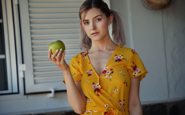 Yellow dress green apple serious free wallpaper for desktop - medium preview image