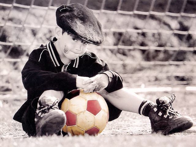 Young boy soccer ball glove free wallpaper for desktop - medium preview image