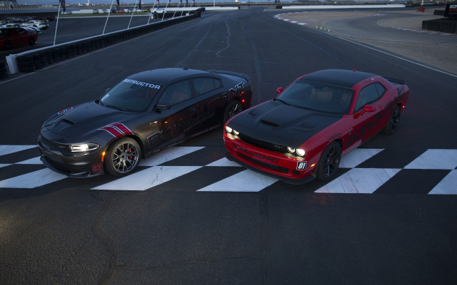 Two cars race track checkered free wallpaper for desktop - medium preview image