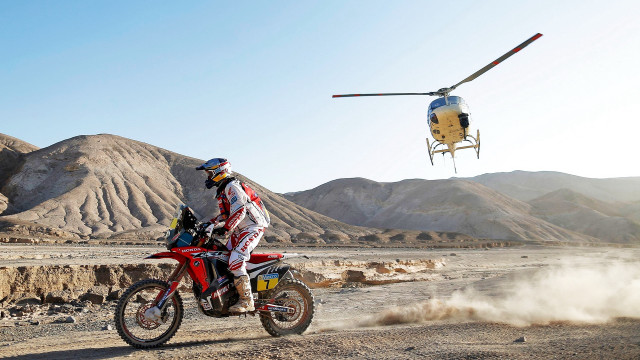 Man dirtbike helicopter desert mountains free wallpaper for desktop - medium preview image
