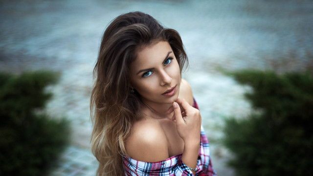 Woman longhair plaidshirt jeans portrait free wallpaper for desktop - medium preview image