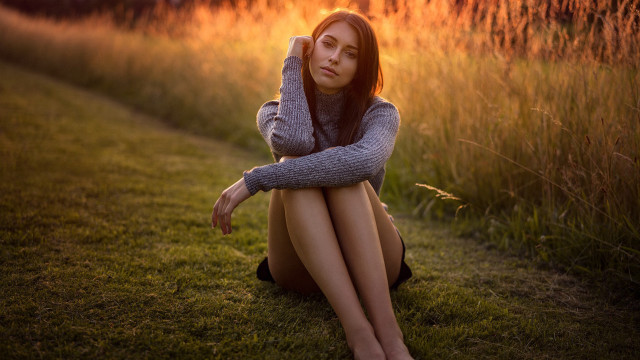 Woman sitting field sunset portrait free wallpaper for desktop - medium preview image