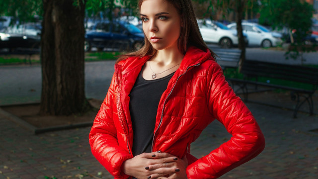 Woman red jacket park portrait free wallpaper for desktop - medium preview image