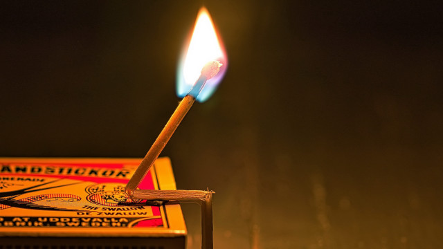 Matchstick lit dark match box free wallpaper for desktop - medium preview image