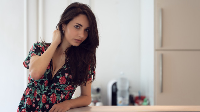 Woman kitchen knife floral portrait free wallpaper for desktop - medium preview image