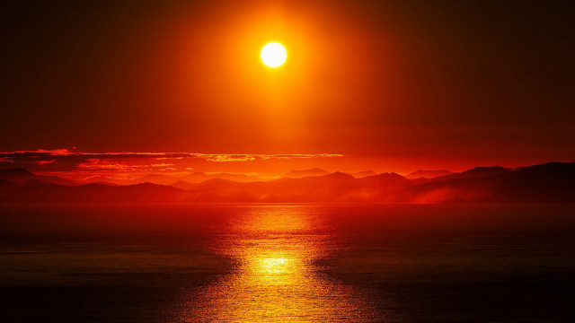 Sunset mountains water orange sky free wallpaper for desktop - medium preview image